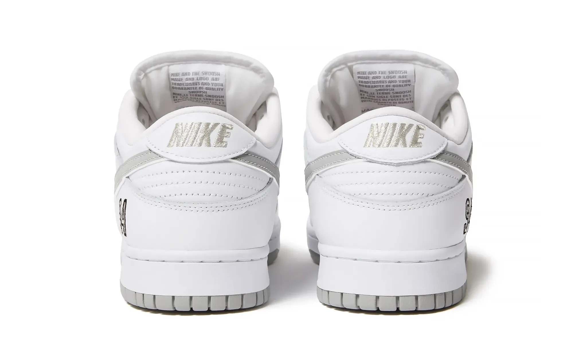 Nike SB Dunk Low Supreme 94 White Metallic Silver